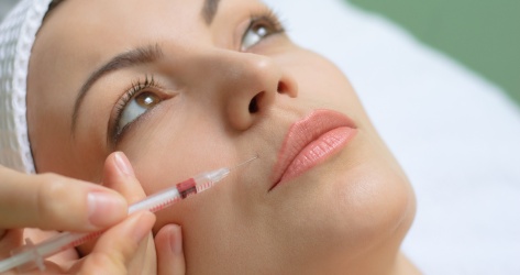 botox injection into upper lip using small syringe with thin needle